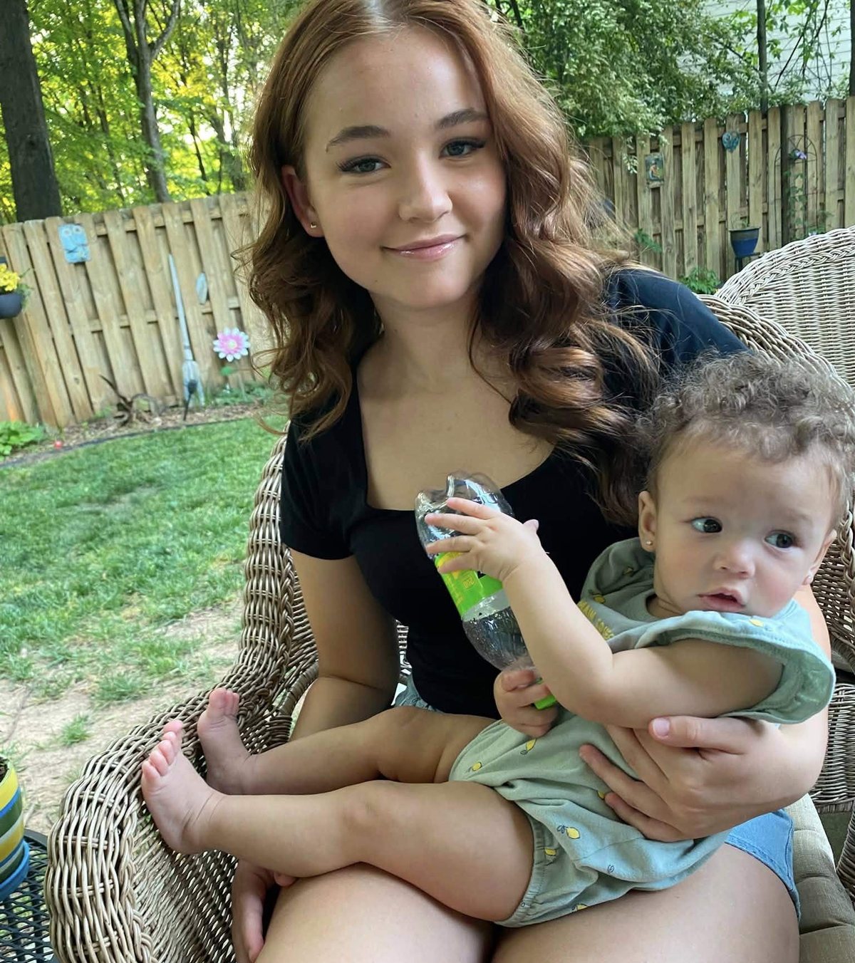 Lily spending time with a young child outdoors